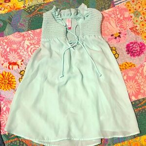like new turquoise sleeveless blouse